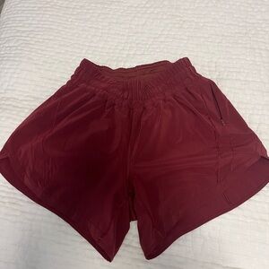 Lululemon pink track that high rise short 5” size 6